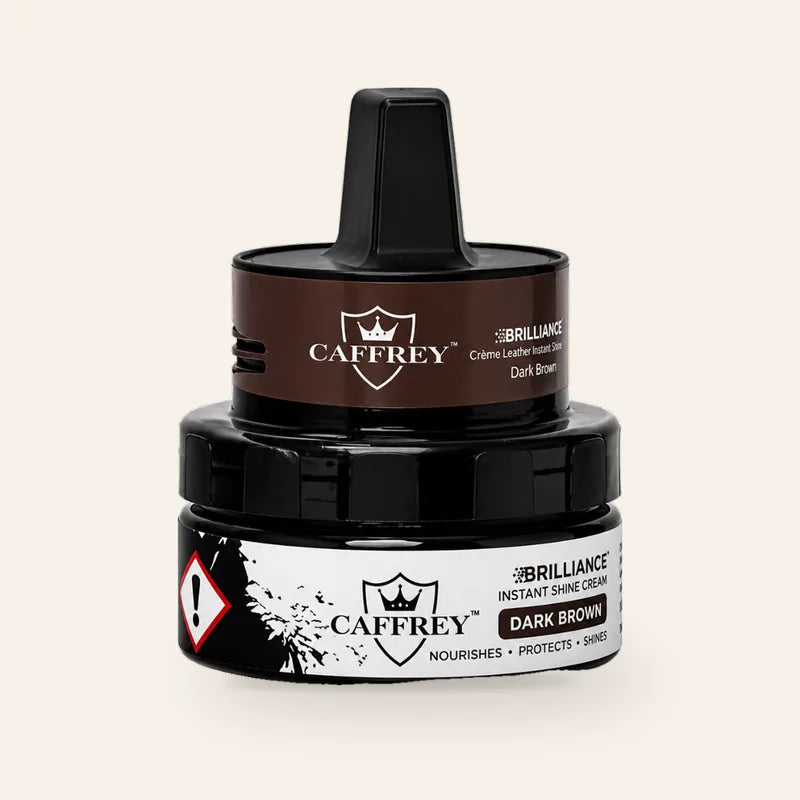 CAFFREY Brilliance Instant Shine Cream, Dark Brown, in its closed jar with raised applicator handle.