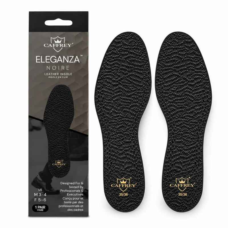 CAFFREY Eleganza Noire box beside a pair of black leather insoles with gold heel crests