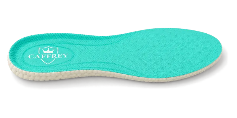 A CAFFREY Odour Smart insole at an angle: green fabric top, white crest at the heel, thicker white beaded base