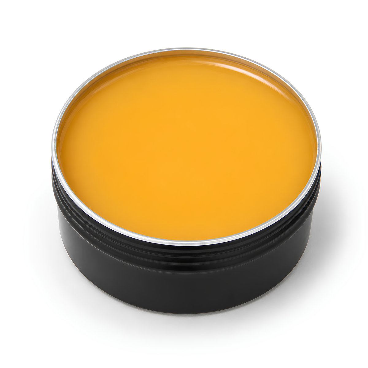 Close view of the amber balm in the CAFFREY Arctic Dubbin 100 ml tin