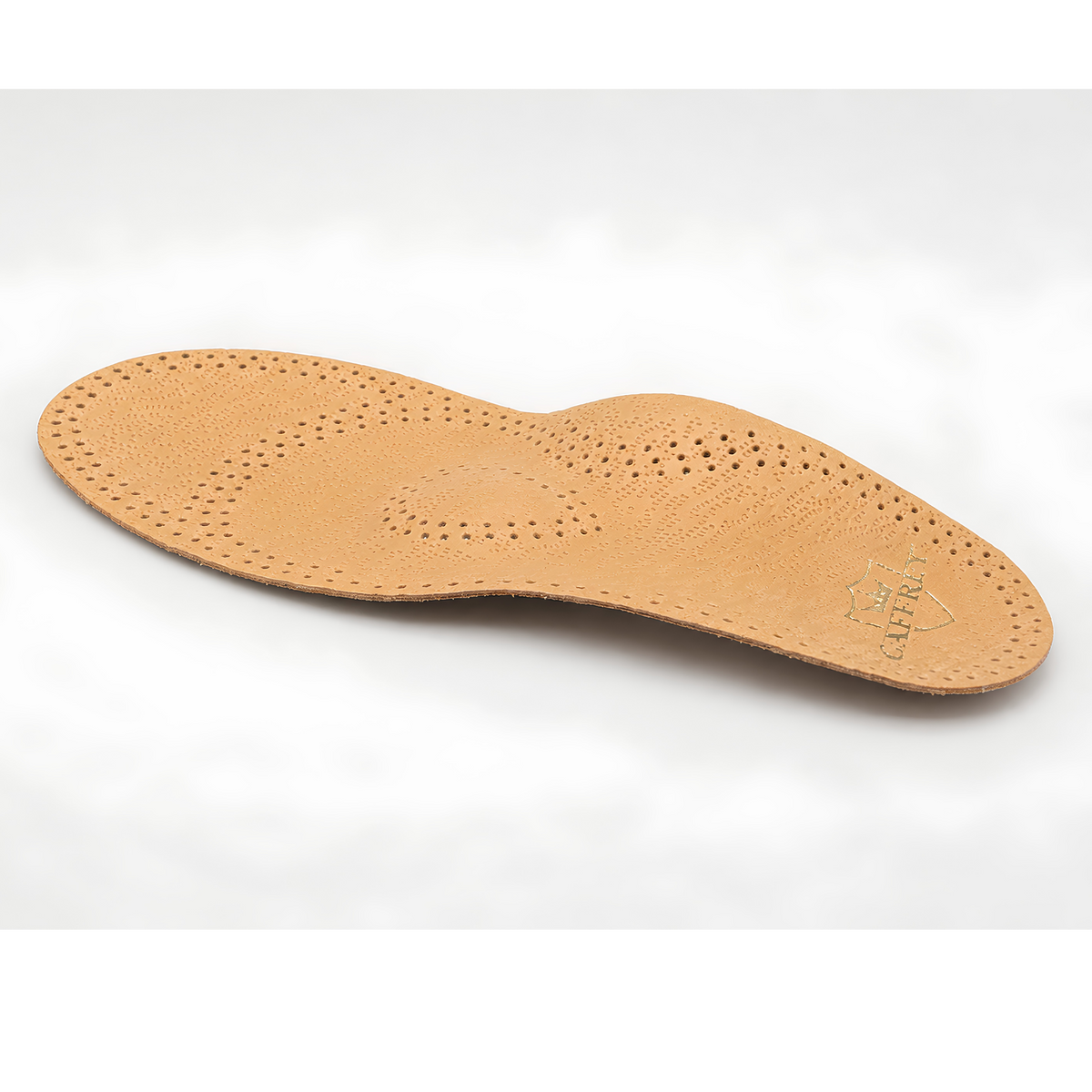 CAFFREY ARPEGGIO angled view showing the raised middle support pad and arch curve beneath perforated leather