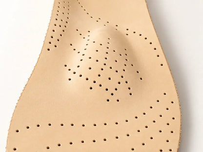 Maestro cow-leather surface showing the raised metatarsal pad and contoured arch