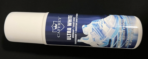 Actual CAFFREY Ultra White bottle, white cap and blue label, photographed lying down