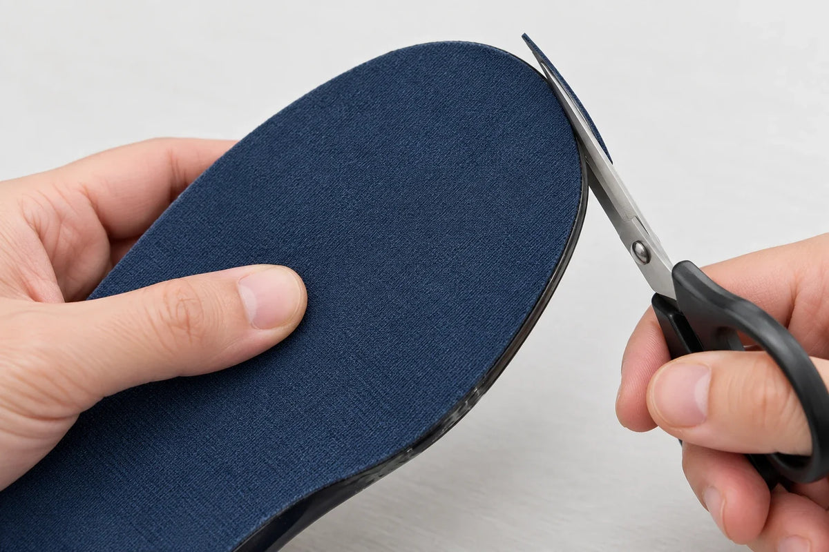 Trimming a narrow strip from the toe of Step Aid, navy fabric side up