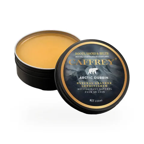 CAFFREY Arctic Dubbin 100 ml tin, open, beside its polar-bear lid