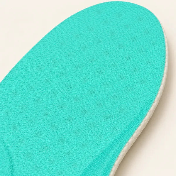 Close-up of the green CAFFREY Odour Smart fabric: a fine textured surface with a faint pattern of darker dots