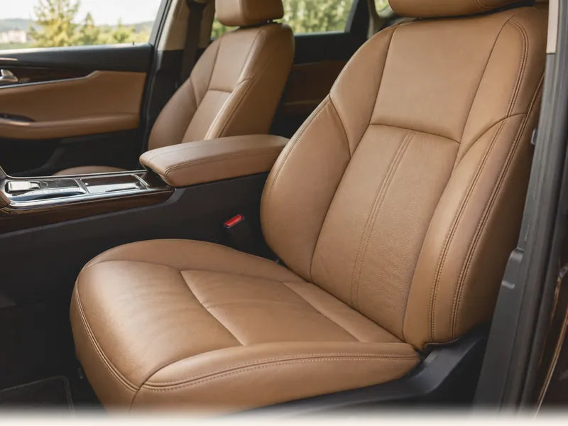Illustration of tan leather car seats in daylight