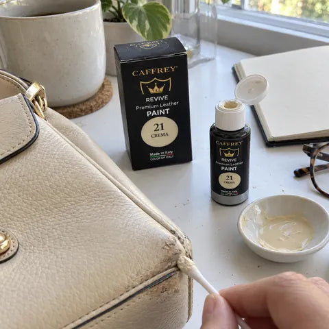 Illustrated project idea: touching up the corners of a cream leather handbag with CAFFREY Revive 21 Crema