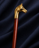 Gold-tone horse-head handle of the Royal Touch shoe horn