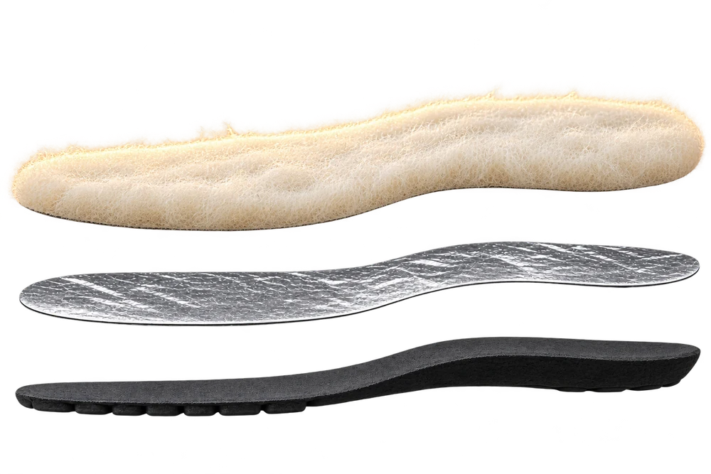 Illustration of Sirocco natural wool, thin aluminium foil and shaped black rubber base separated to show each material